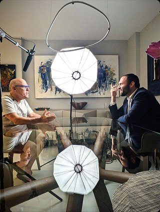 Laibel conducting an interview on set